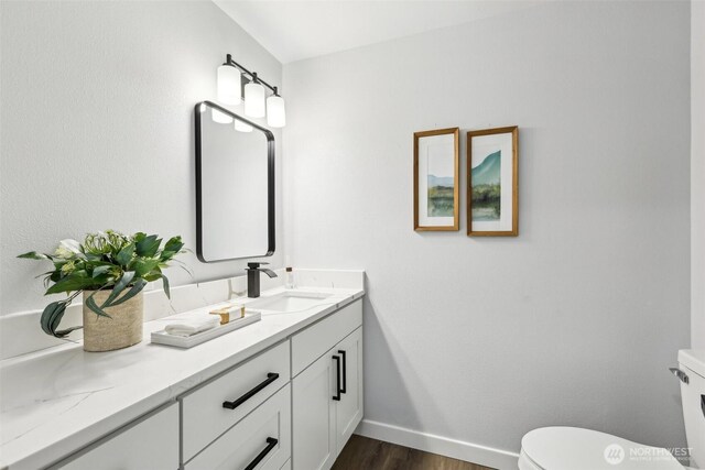 4715 S Cushman Ave, Tacoma, WA 98408 - bathroom featuring vanity and wood finished floors