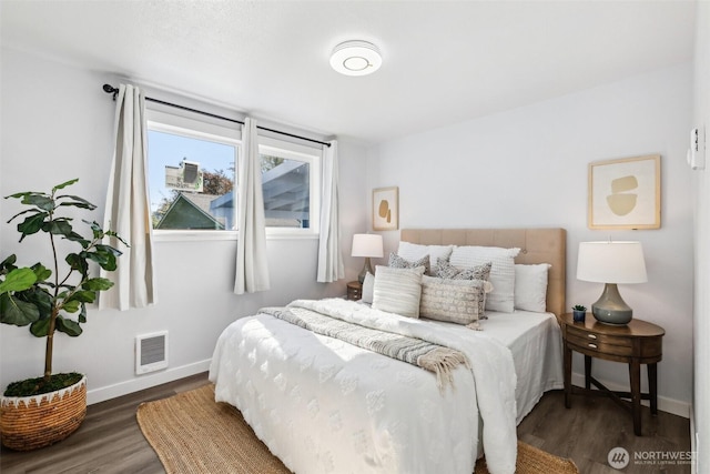 4715 S Cushman Ave, Tacoma, WA 98408 - bedroom featuring dark wood-style floors and baseboards