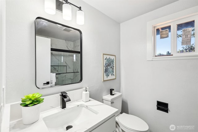 4715 S Cushman Ave, Tacoma, WA 98408 - bathroom with a marble finish shower and vanity