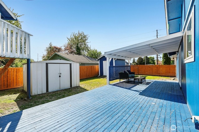 4715 S Cushman Ave, Tacoma, WA 98408 - wooden terrace with a storage unit and a fenced backyard