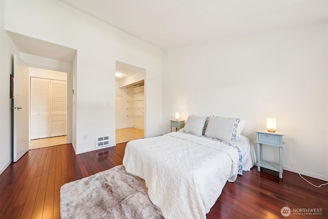 5813 S 238th Ct Unit F2, Kent, WA 98032 - bedroom with hardwood / wood-style flooring and baseboards