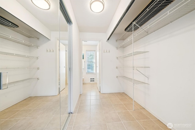 5813 S 238th Ct Unit F2, Kent, WA 98032 - walk in closet with light tile patterned flooring