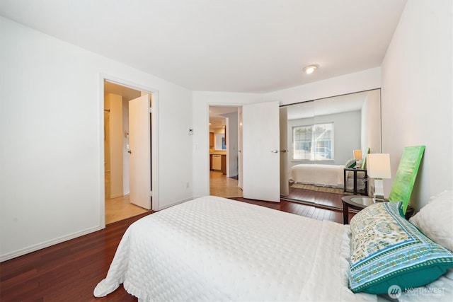 5813 S 238th Ct Unit F2, Kent, WA 98032 - bedroom featuring wood finished floors