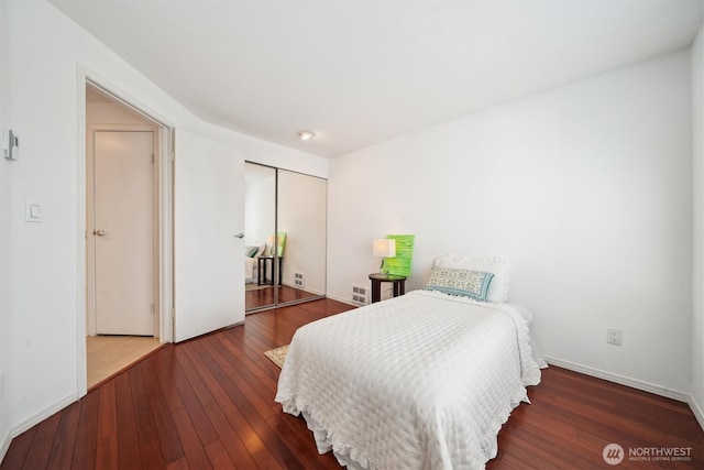 5813 S 238th Ct Unit F2, Kent, WA 98032 - bedroom featuring hardwood / wood-style floors and a closet