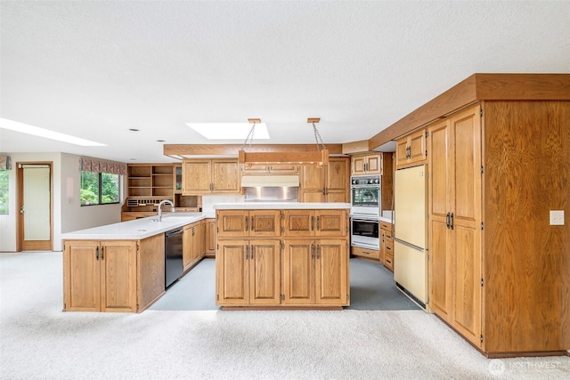 3524 SW 325th St, Federal Way, WA 98023 - kitchen with a skylight, freestanding refrigerator, dishwasher, double oven, and light countertops