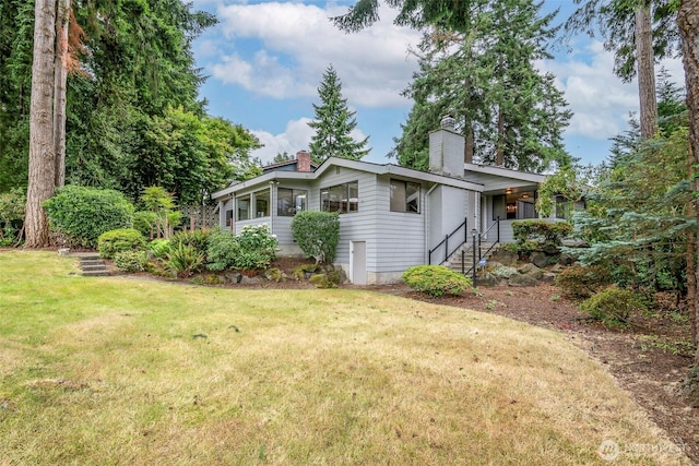 3524 SW 325th St, Federal Way, WA 98023 - view of side of property featuring a chimney and a yard