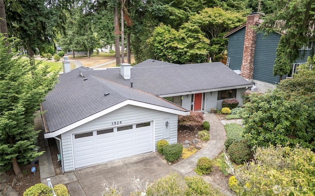 3524 SW 325th St, Federal Way, WA 98023 - view of front facade with a garage, roof with shingles, and a chimney