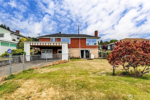 727 E 11th St, Port Angeles, WA 98362 - back of property featuring a chimney and a carport