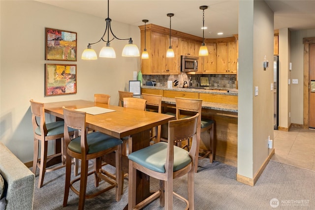 3770 Suncadia Trl Unit 309, Cle Elum, WA 98922 - dining space with baseboards and light carpet