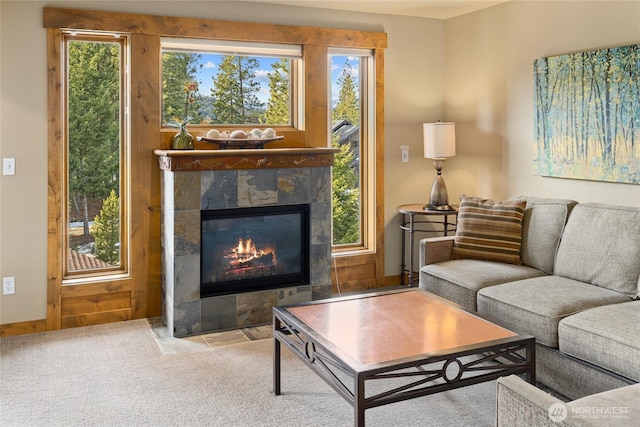 3770 Suncadia Trl Unit 309, Cle Elum, WA 98922 - living room with a tiled fireplace and carpet flooring