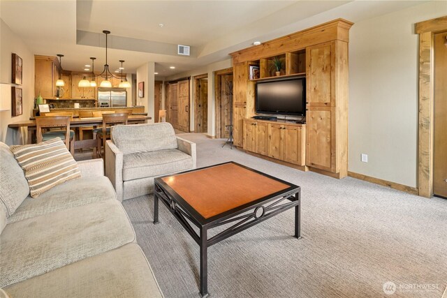 3770 Suncadia Trl Unit 309, Cle Elum, WA 98922 - living area featuring light colored carpet, a chandelier, and recessed lighting