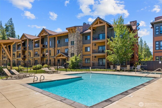 3770 Suncadia Trl Unit 309, Cle Elum, WA 98922 - community pool with a patio
