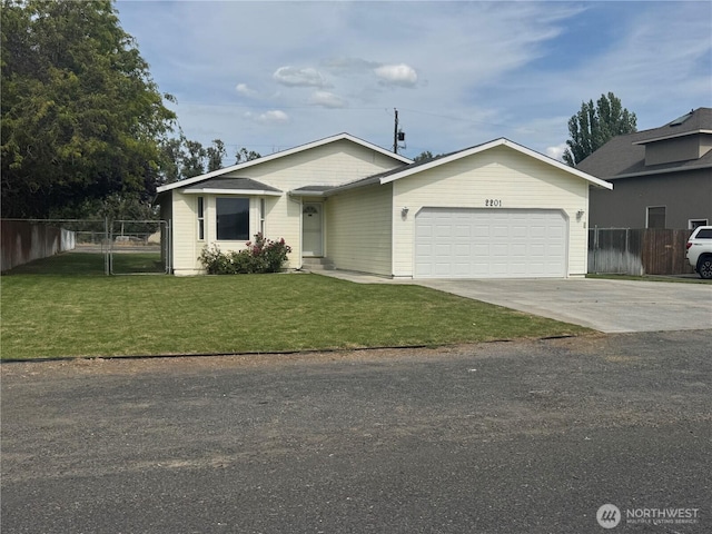 2201 Elgin Rd NE, Moses Lake, WA 98837 - view of front of home featuring an attached garage and driveway