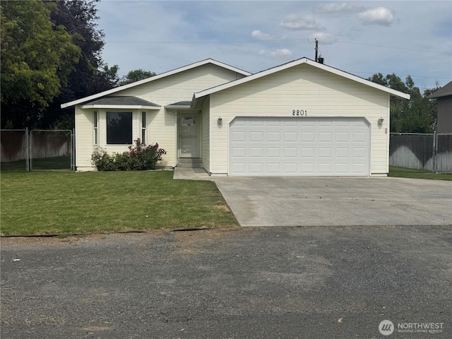 2201 Elgin Rd NE, Moses Lake, WA 98837 - view of front facade featuring an attached garage and driveway