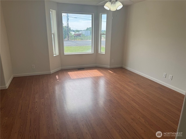 2201 Elgin Rd NE, Moses Lake, WA 98837 - spare room featuring wood finished floors and a ceiling fan