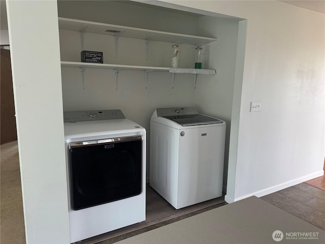 2201 Elgin Rd NE, Moses Lake, WA 98837 - washroom featuring independent washer and dryer and wood finished floors