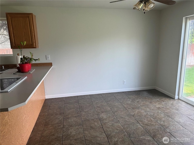 2201 Elgin Rd NE, Moses Lake, WA 98837 - unfurnished dining area with healthy amount of natural light and ceiling fan