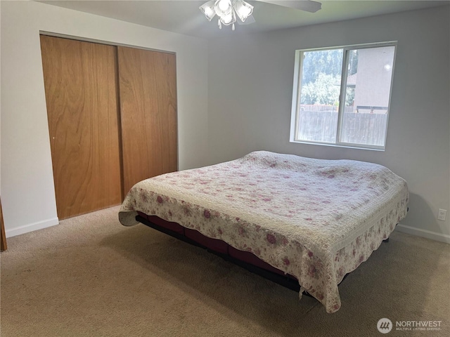 2201 Elgin Rd NE, Moses Lake, WA 98837 - bedroom with carpet flooring, a closet, and a ceiling fan