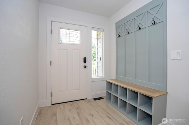 6203 119th St E, Puyallup, WA 98373 - mudroom with light wood-type flooring and baseboards