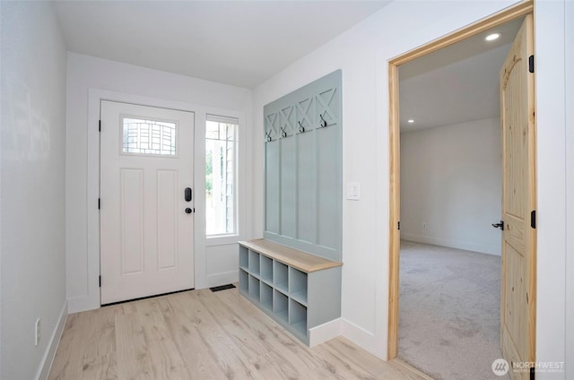 6203 119th St E, Puyallup, WA 98373 - mudroom with baseboards and light wood-style floors