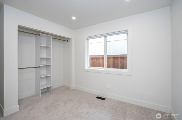 6203 119th St E, Puyallup, WA 98373 - unfurnished bedroom with carpet flooring, recessed lighting, and a closet