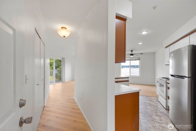 2255 Highview Ln W Unit D101, Bremerton, WA 98312 - hall with healthy amount of natural light, recessed lighting, and light wood-style floors