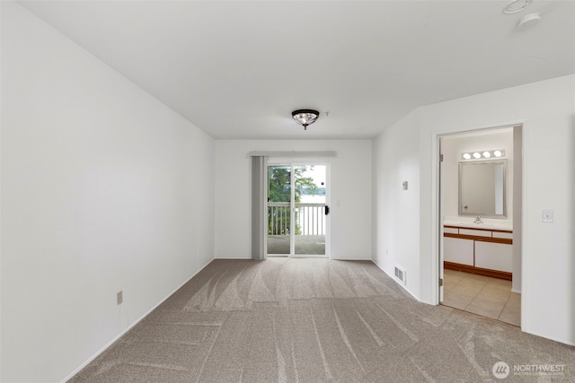 2255 Highview Ln W Unit D101, Bremerton, WA 98312 - carpeted spare room featuring a sink