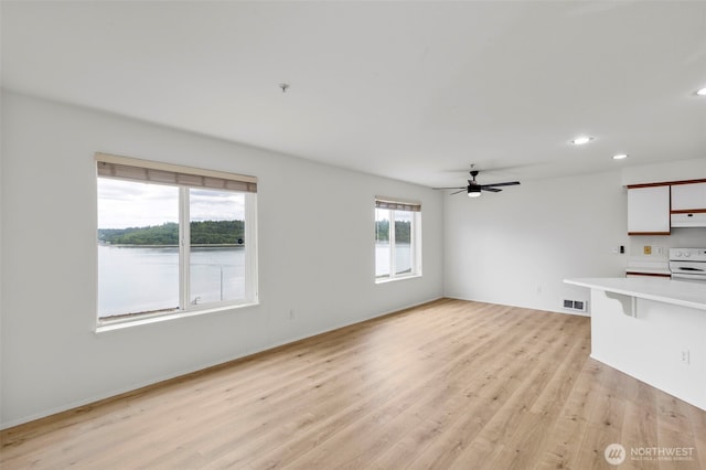 2255 Highview Ln W Unit D101, Bremerton, WA 98312 - unfurnished living room with light wood-style floors, recessed lighting, and ceiling fan