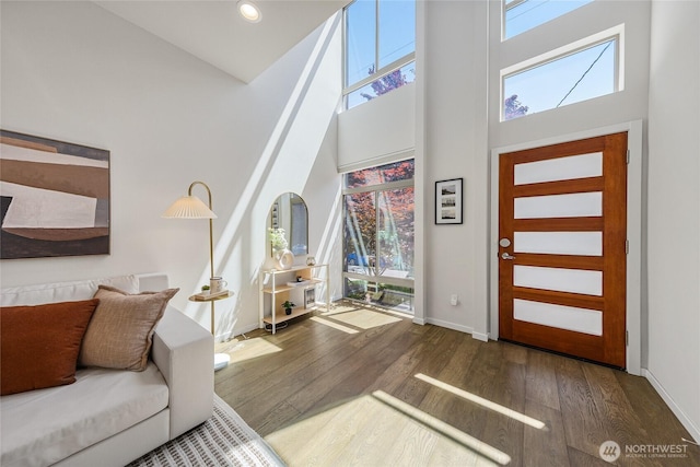 2224 NW 62nd St Unit C, Seattle, WA 98107 - foyer featuring a towering ceiling, wood finished floors, plenty of natural light, and recessed lighting