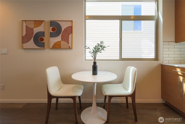 2224 NW 62nd St Unit C, Seattle, WA 98107 - dining area featuring healthy amount of natural light and dark wood-style floors