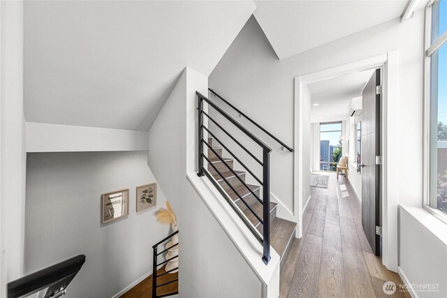 2224 NW 62nd St Unit C, Seattle, WA 98107 - staircase featuring wood finished floors