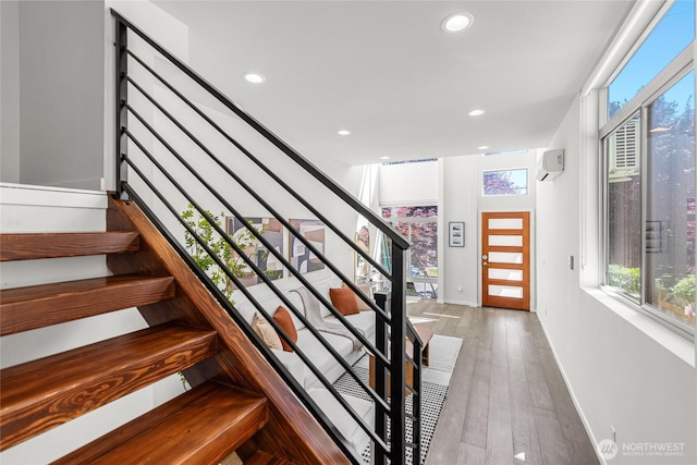 2224 NW 62nd St Unit C, Seattle, WA 98107 - stairs featuring recessed lighting and wood finished floors