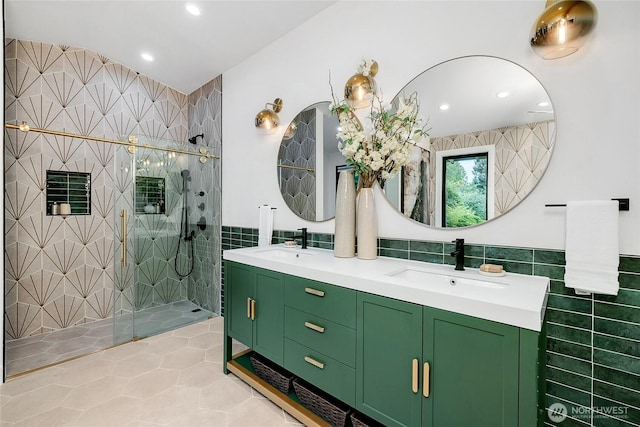 9101 SE 57th St, Mercer Island, WA 98040 - bathroom featuring tile walls, tile patterned floors, double vanity, a stall shower, and recessed lighting
