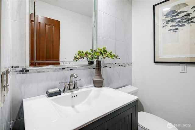 9101 SE 57th St, Mercer Island, WA 98040 - bathroom with vanity and tile walls