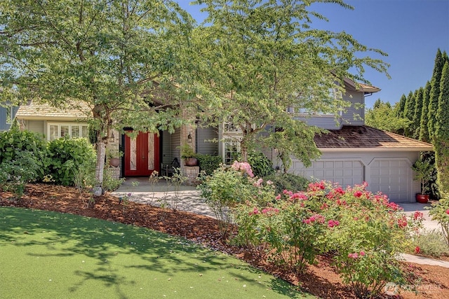 20821 NE 141st St, Woodinville, WA 98077 - view of property hidden behind natural elements featuring an attached garage