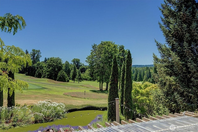 20821 NE 141st St, Woodinville, WA 98077 - surrounding community with a yard, a putting area, and view of golf course
