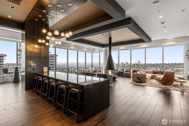 1808 Minor Ave Unit 3601, Seattle, WA 98101 - kitchen featuring dark wood-type flooring, floor to ceiling windows, plenty of natural light, and pendant lighting
