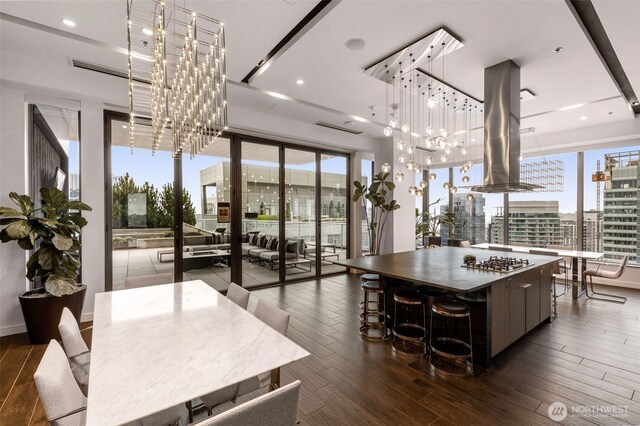 1808 Minor Ave Unit 3601, Seattle, WA 98101 - dining area featuring a chandelier, dark wood-type flooring, and recessed lighting