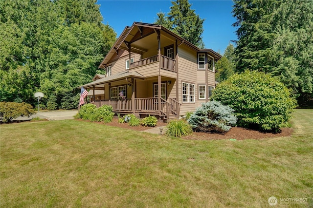 36434 249th Ave SE, Enumclaw, WA 98022 - view of front of house featuring a balcony, a porch, and a front yard
