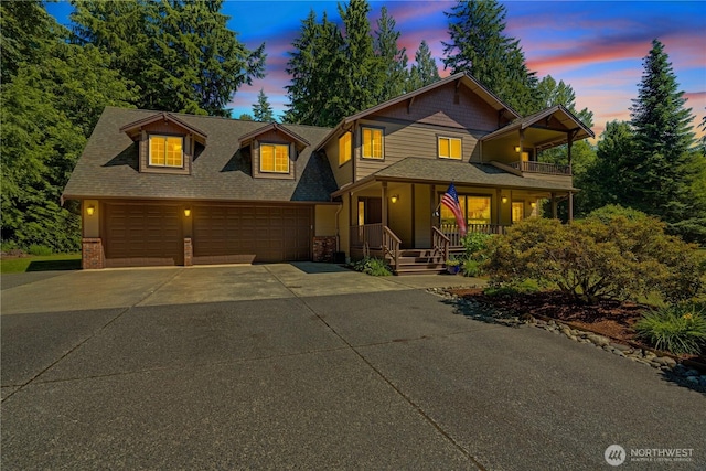 36434 249th Ave SE, Enumclaw, WA 98022 - view of front facade featuring covered porch, concrete driveway, roof with shingles, an attached garage, and a balcony