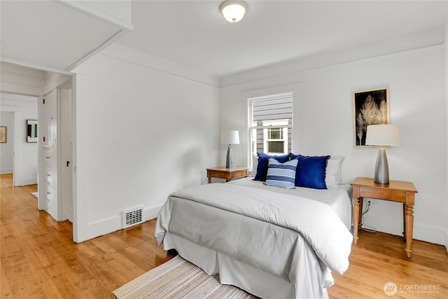 1523 4th Ave N, Seattle, WA 98109 - bedroom with light wood-style floors and baseboards