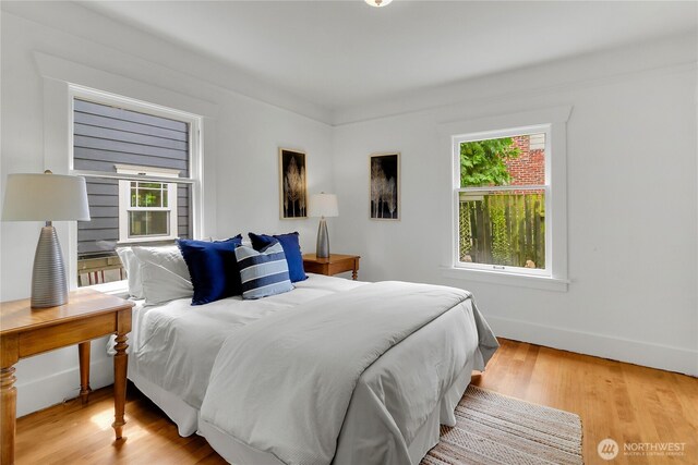 1523 4th Ave N, Seattle, WA 98109 - bedroom with wood finished floors and baseboards