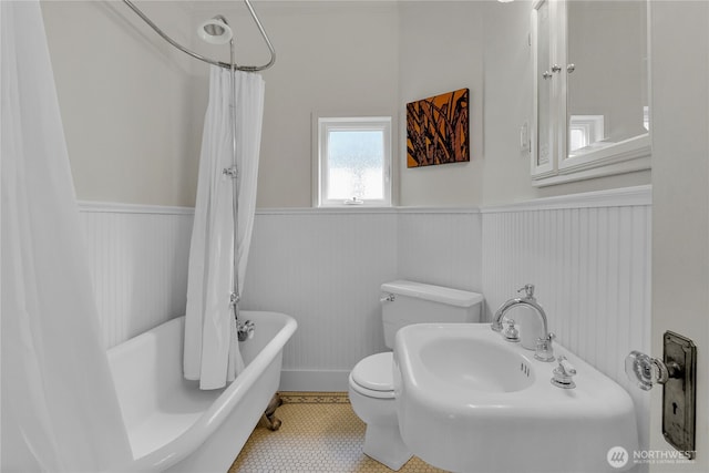 1523 4th Ave N, Seattle, WA 98109 - full bathroom featuring wainscoting and shower / bath combination with curtain