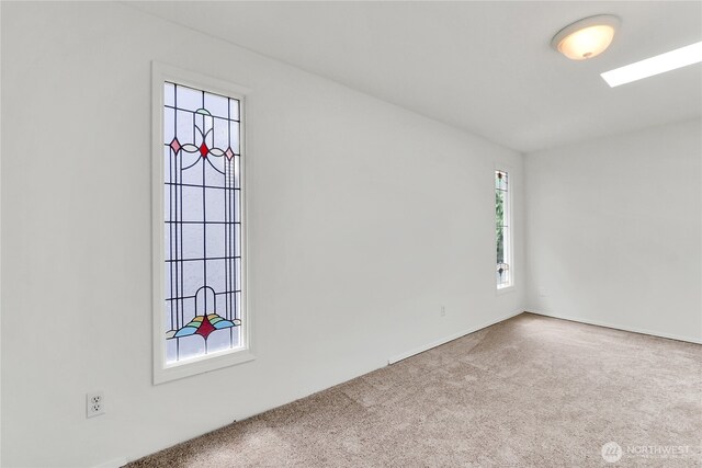 1523 4th Ave N, Seattle, WA 98109 - carpeted empty room featuring baseboards