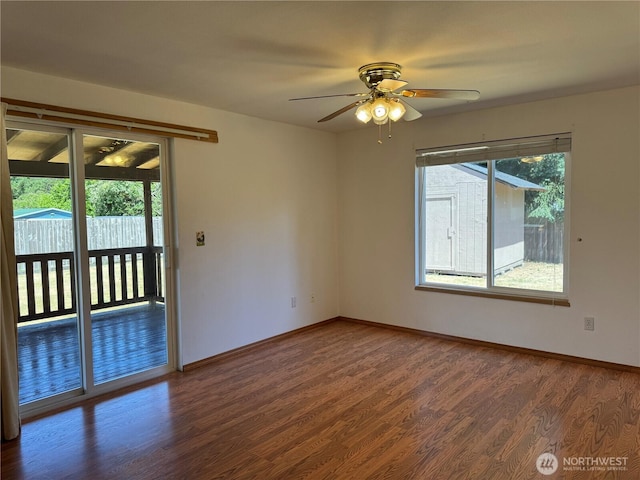 16322 83rd Ct SE, Yelm, WA 98597 - empty room featuring plenty of natural light, a ceiling fan, and wood finished floors