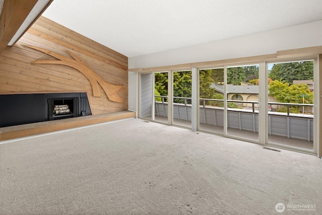4983 120th Ave SE, Bellevue, WA 98006 - unfurnished living room featuring wood walls and carpet floors