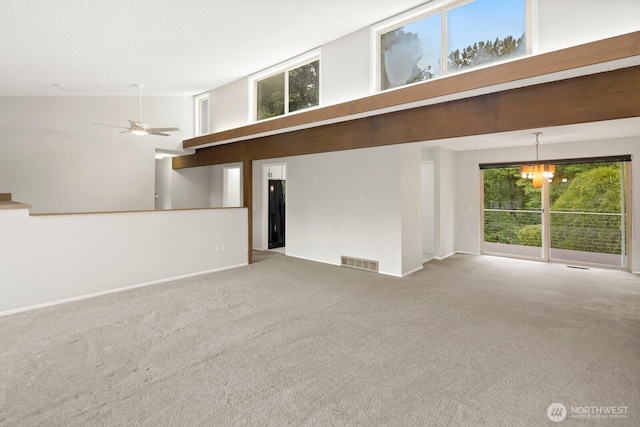 4983 120th Ave SE, Bellevue, WA 98006 - empty room with a towering ceiling, carpet flooring, a ceiling fan, and a chandelier