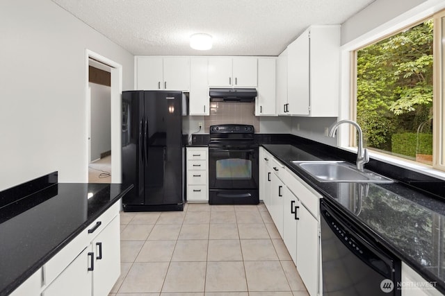 4983 120th Ave SE, Bellevue, WA 98006 - kitchen featuring black appliances, under cabinet range hood, a textured ceiling, decorative backsplash, and light tile patterned floors