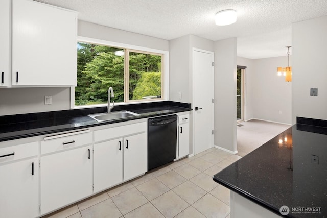 4983 120th Ave SE, Bellevue, WA 98006 - kitchen featuring dishwasher, a textured ceiling, white cabinetry, light tile patterned floors, and dark stone countertops