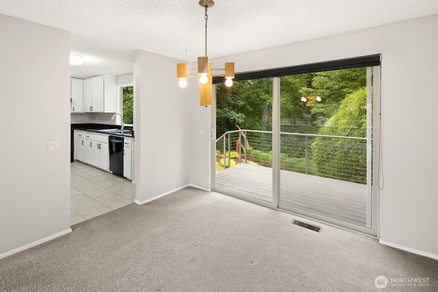 4983 120th Ave SE, Bellevue, WA 98006 - unfurnished dining area featuring plenty of natural light, light carpet, a textured ceiling, a chandelier, and light tile patterned floors